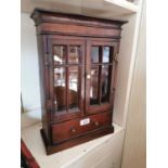 Miniature two door glazed display cabinet