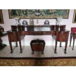 Exceptional quality William IV. Irish flamed mahogany breakfront server