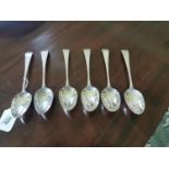 Set of six English silver dessert spoons.
