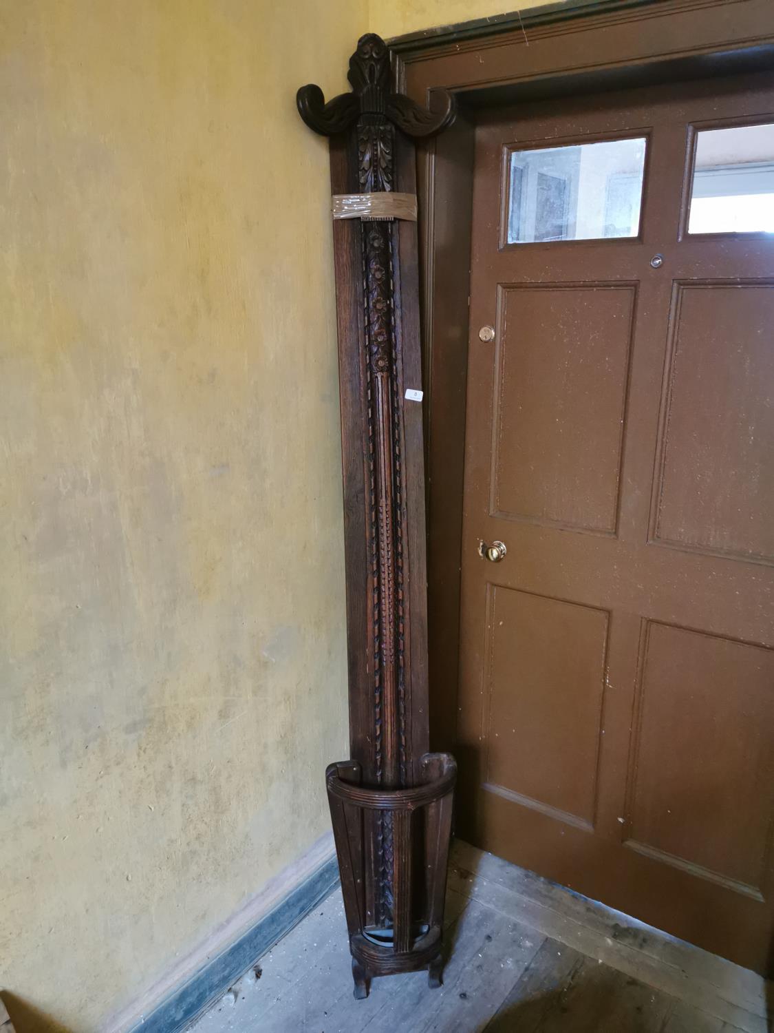 Unusual carved oak coat and stick stand.