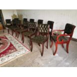 Twelve leather upholstered mahogany chairs