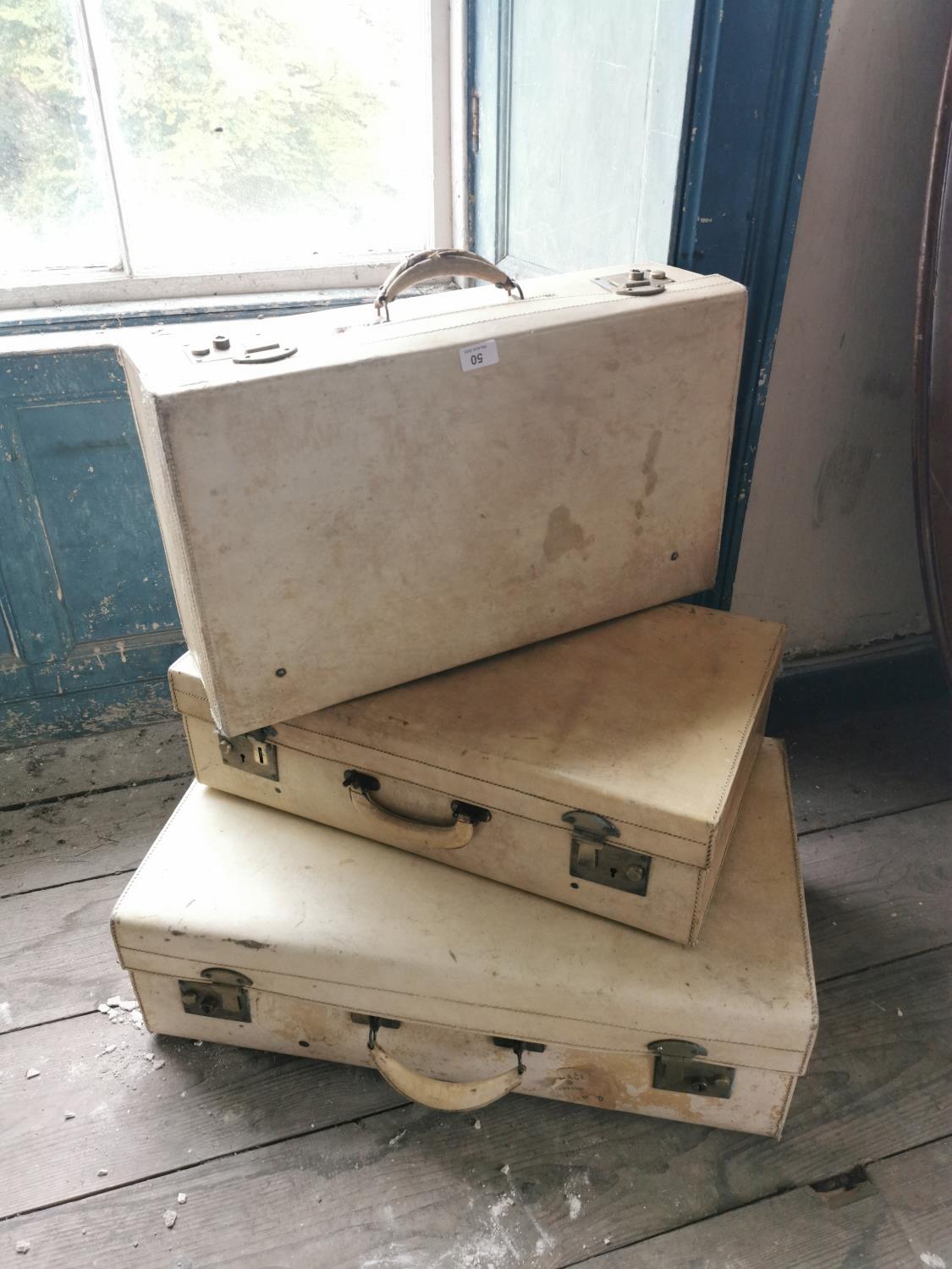 Three white leather suitcases. - Image 2 of 2