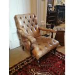 Early 20th. C. leather upholstered armchair