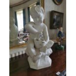 19th. C. marble figure of a seated Boy