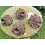 Set of four cast iron lions masks.