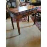 Irish Georgian mahogany triple turn over leaf games table on square legs and brass casters {75 cm H