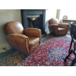 Pair of 1930's leather tub chairs.