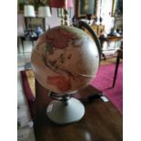 World globe on brass stand