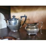 English silver teapot with ebony mounts