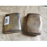 Two English silver cigarette cases.