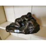 Bronze sculpture of a Reclining Lady.