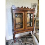 Exceptional quality Georgian walnut marquetry cabinet on stand.