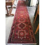 Hand knotted carpet Runner.