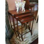 Nest of three Edwardian occasional tables.