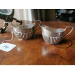 English silver cream jug and sugar bowl.