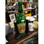 J & B Bottle on stand.