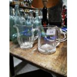 Two Gallagher's glass water jugs.