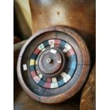 Wooden roulette wheel.