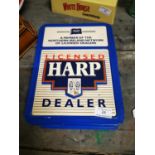 Harp Dealer plastic advertising sign.