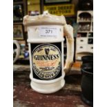 Guinness tankard.