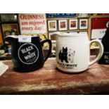 Two Black and White Scotch Whiskey ceramic water jugs