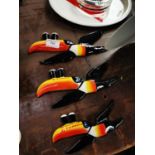 Set of three graduated flying Guinness Toucans.