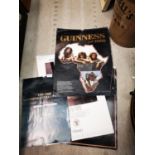 Four Guinness advertising calendars.