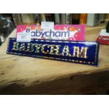 Babysham clip on advertising sign.