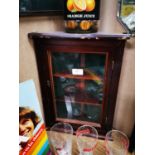 Corner mahogany display cabinet.