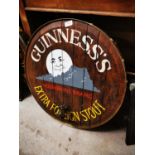 Guinness wooden advertising barrell end.
