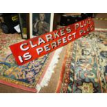 Clarke's Plug enamel advertising sign.