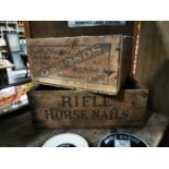 Two wooden advertising boxes