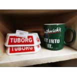 Two ceramic ashtrays and Smithwick's advertising mug.