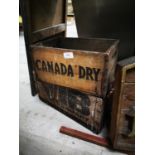 Two wooden advertising drinks crates.