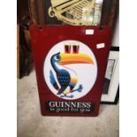 Guinness double sided enamel advertisng sign.