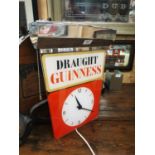 Draught Guinness advertising clock.