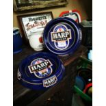 Two Harp tinplate ashtrays