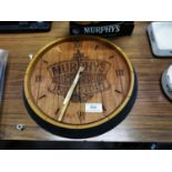 Murphy's Irish Stout wooden advertising clock. {32 cm Diam}.