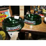 Two Smithwick's glass ashtrays.