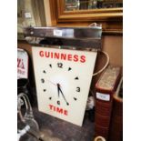 Guinness Time hanging advertising clock.