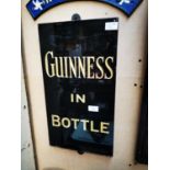 Guinness In A Bottle slate advertising sign.