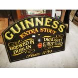 Guinness Extra Stout wooden advertising sign.