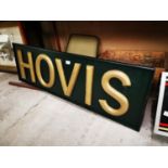 Painted wooden Hovis advertising sign.