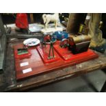 Model of a stationery engine on mahogany base.