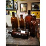 Five misc. old whiskey bottles.