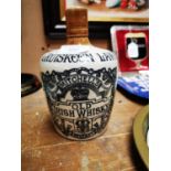 Cruiskeen Lawn Old Irish Whiskey stoneware advertising flagon.