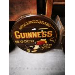 Guinness wooden and brass advertising barrel end.