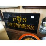 1758 Guinness advertisement on glass.