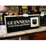 Guinness advertising sign.