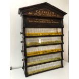 Gallaher's Cigarettes by Weight advertising cabinet.